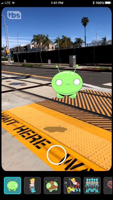 Final Space AR: Mooncake placed on a sunny street through the phone camera, with a character carousel below